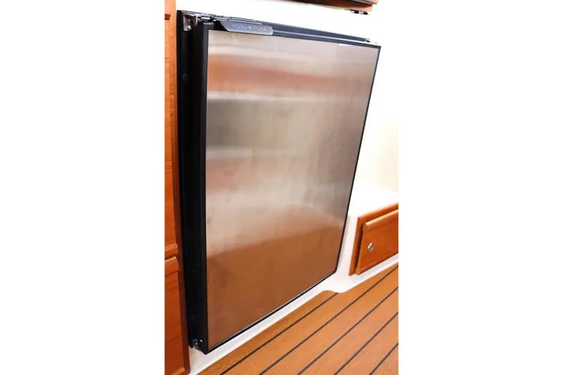 Tail Finn Yacht Photos Pics Stainless steel refrigerator in 2021 Ranger Tugs R-27 boat interior.