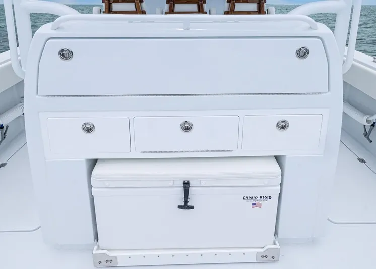  Yacht Photos Pics Invincible 40 Catamaran 2026 with storage drawers and cooler on deck.