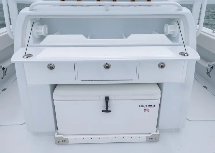  Yacht Photos Pics 2026 Invincible 40 Catamaran fishing station with storage drawers and cooler.