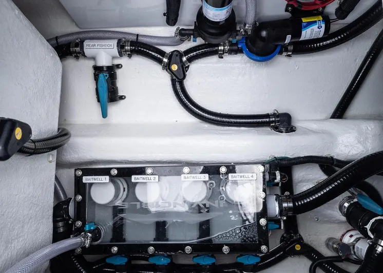  Yacht Photos Pics Engine compartment of 2026 Invincible 40 Catamaran with baitwell system and plumbing.