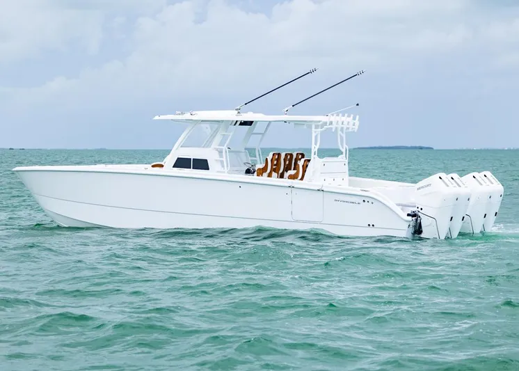  Yacht Photos Pics 2026 Invincible 40 Catamaran on open water, featuring sleek design and powerful engines.