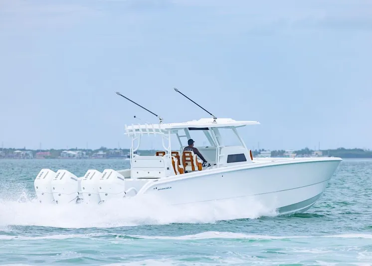  Yacht Photos Pics Invincible 40 Catamaran 2026 cruising on open water with four engines.