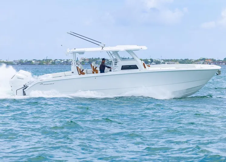  Yacht Photos Pics 2026 Invincible 40 Catamaran cruising on open water, showcasing sleek design and performance.