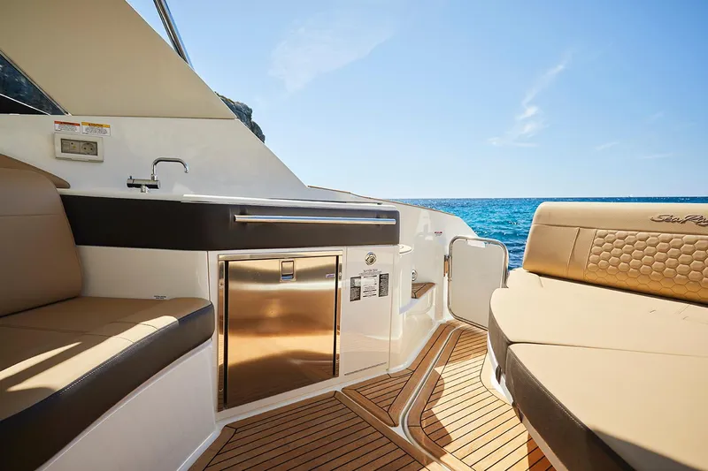  Yacht Photos Pics Manufacturer Provided Image: Luxurious 2025 Sea Ray Sundancer 320 yacht interior with ocean view.