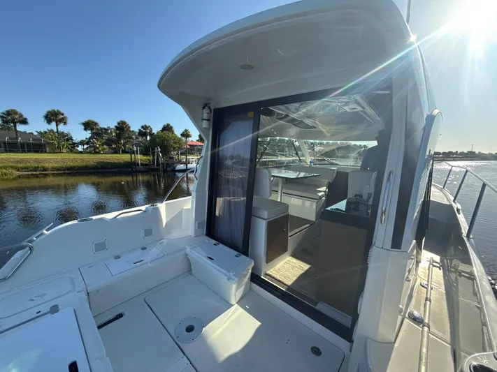  Yacht Photos Pics 2020 Beneteau Antares 9 OB boat, featuring spacious deck and modern interior design.