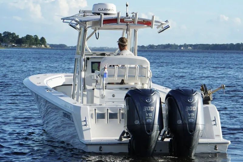 Yacht Photos Pics 2023 Contender 30 Tournament boat with dual Yamaha engines on open water.