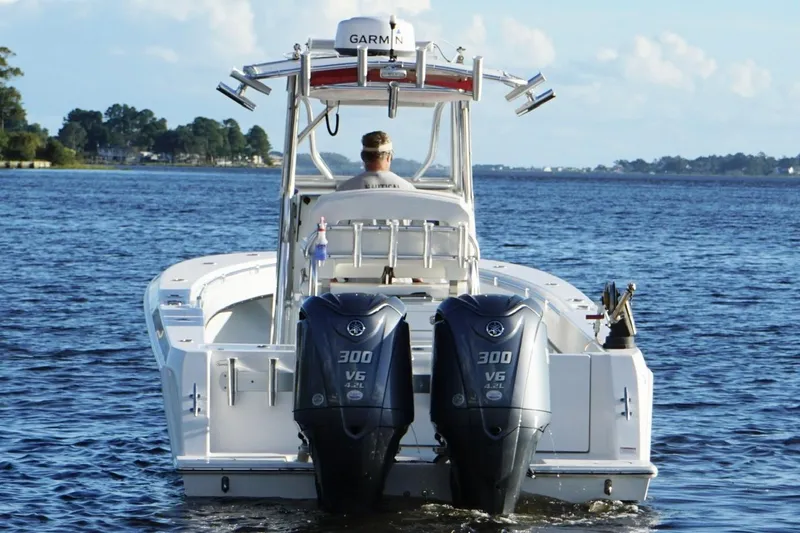  Yacht Photos Pics 2023 Contender 30 Tournament boat with dual Yamaha 300 V6 engines on open water.