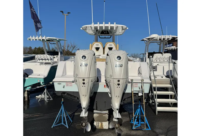  Yacht Photos Pics 2024 Sportsman Open 262 Center Console with twin outboard engines.