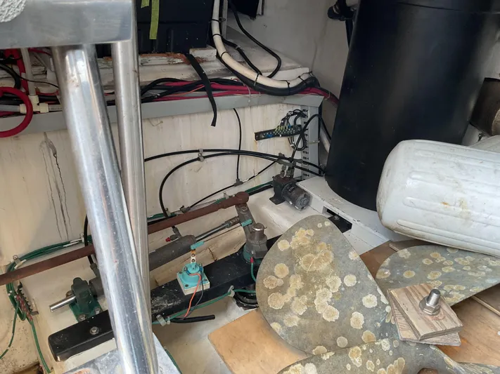  Yacht Photos Pics Engine room of 2000 Carver 530 Voyager Pilothouse with propeller and mechanical components.