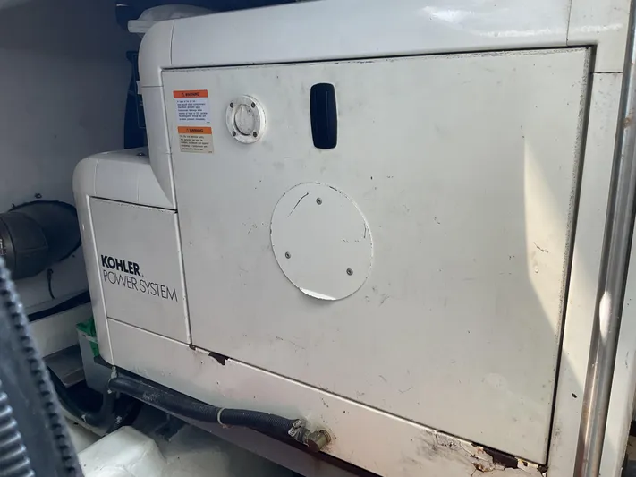  Yacht Photos Pics Kohler power system in a 2000 Carver 530 Voyager Pilothouse yacht engine room.