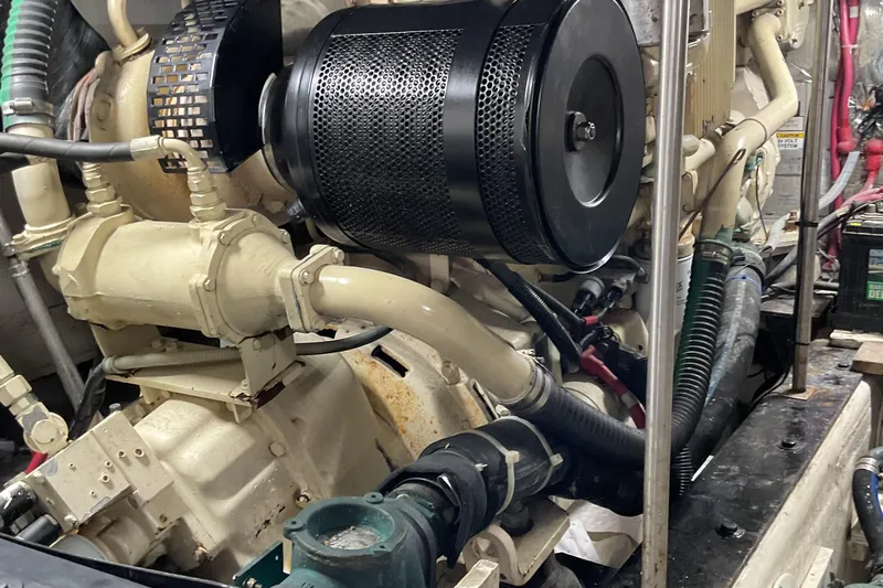  Yacht Photos Pics Engine room of a 2000 Carver 530 Voyager Pilothouse, showcasing mechanical components.