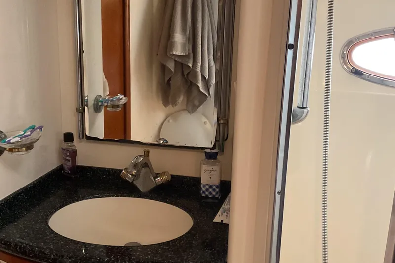  Yacht Photos Pics Bathroom sink area in 2000 Carver 530 Voyager Pilothouse yacht.