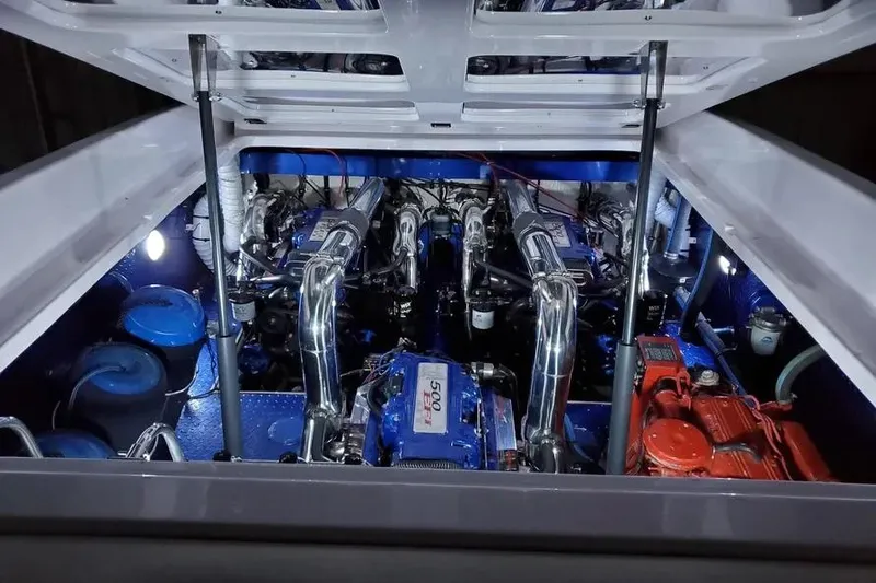  Yacht Photos Pics Engine compartment of a 2000 Donzi Daytona 45, showcasing powerful marine engines.