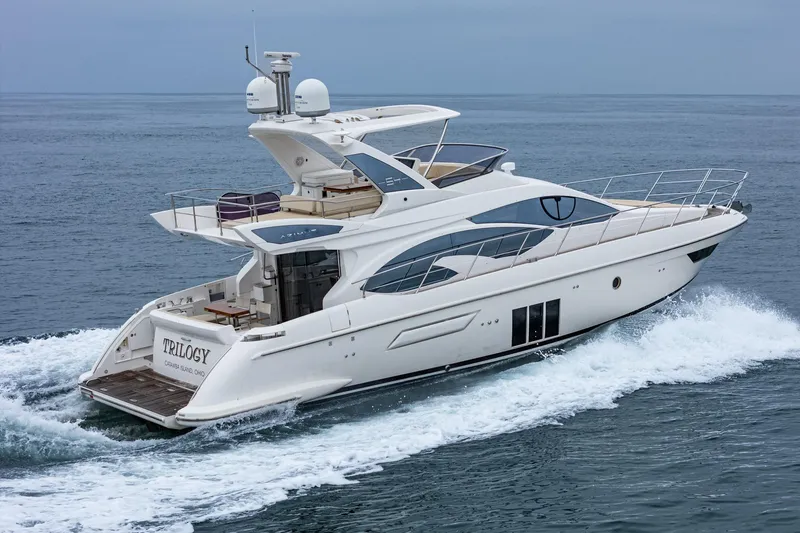  Yacht Photos Pics 2017 Azimut 54 Flybridge yacht cruising on open water.