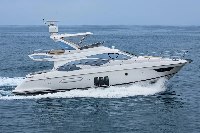  Yacht Photos Pics 2017 Azimut 54 Flybridge yacht cruising on open water.