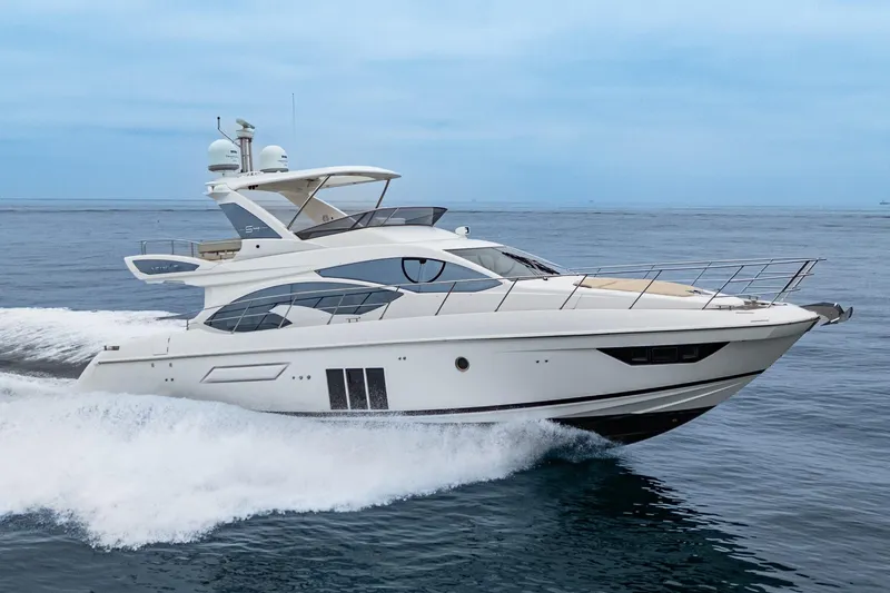  Yacht Photos Pics 2017 Azimut 54 Flybridge yacht cruising on open water.