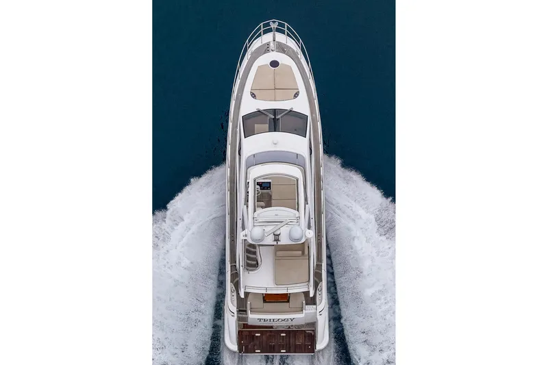  Yacht Photos Pics Overhead view of 2017 Azimut 54 Flybridge yacht cruising on water.