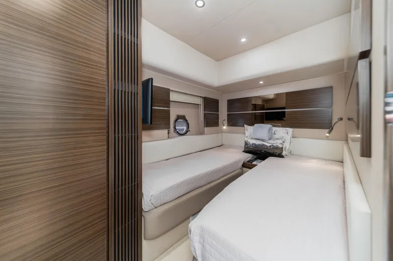  Yacht Photos Pics Luxurious 2017 Azimut 54 Flybridge yacht cabin with twin beds and modern decor.