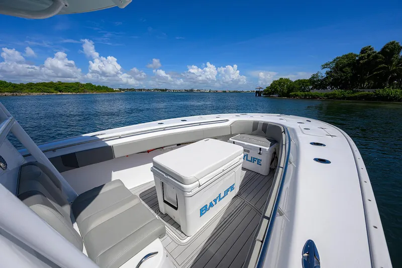 Bay Life Yacht Photos Pics 2024 Cape Horn 31T boat on calm water, featuring spacious seating and clear blue skies.
