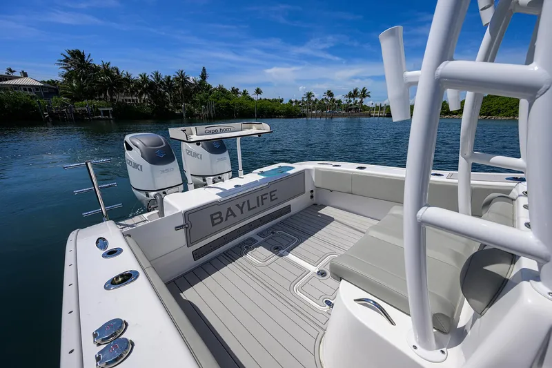 Bay Life Yacht Photos Pics 2024 Cape Horn 31T boat on water, featuring spacious deck and twin engines.