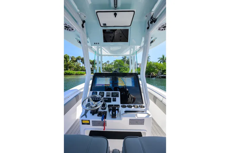 Bay Life Yacht Photos Pics 2024 Cape Horn 31T boat cockpit with advanced navigation system and steering wheel.