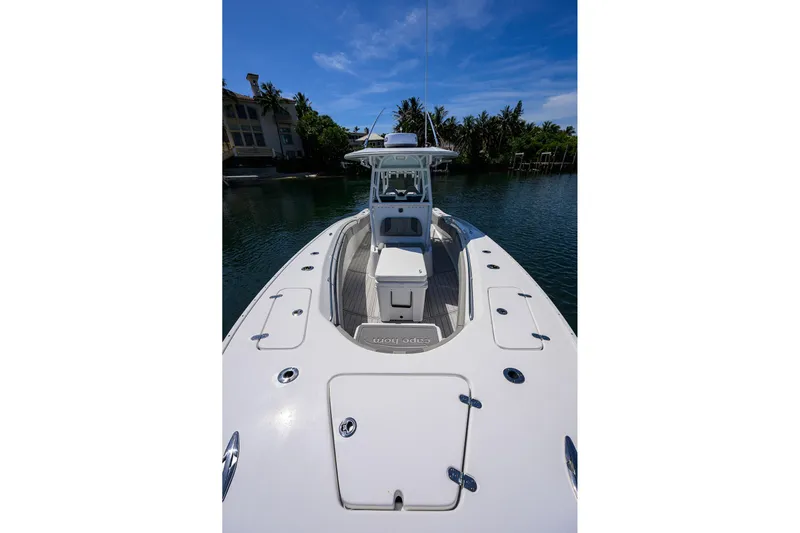 Bay Life Yacht Photos Pics 2024 Cape Horn 31T boat on calm water, showcasing sleek design and spacious deck.