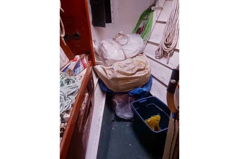 Cloud Chaser Yacht Photos Pics Storage area on a 1997 Hike Metal Products 67-foot ketch, with ropes and supplies.