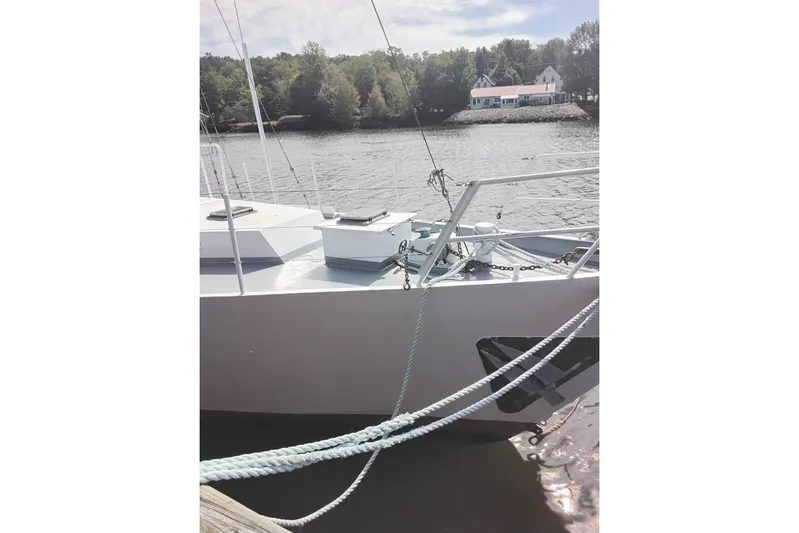 Cloud Chaser Yacht Photos Pics 67-foot steel ketch by Hike Metal Products, docked by a serene riverside, 1997 model.