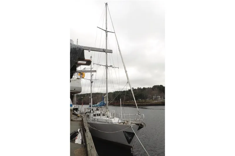 Cloud Chaser Yacht Photos Pics 67-foot steel ketch by Hike Metal Products, docked, overcast sky, 1997 model.