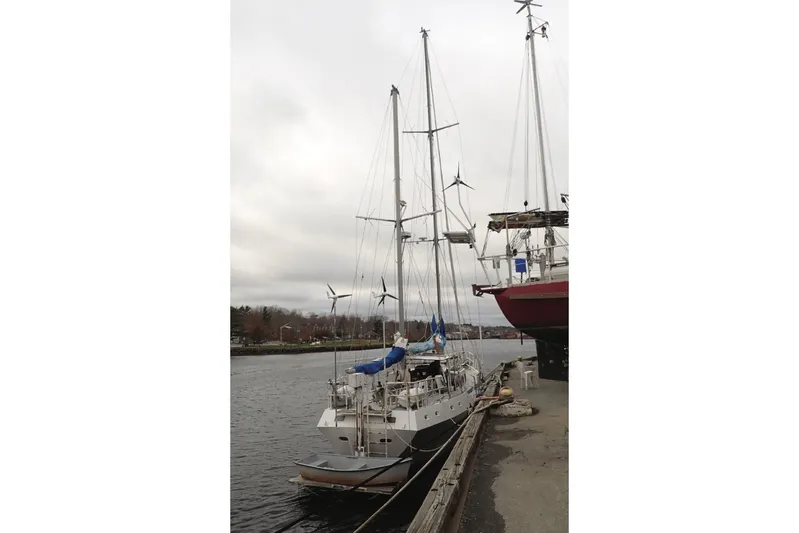 Cloud Chaser Yacht Photos Pics 67-foot steel ketch by Hike Metal Products, docked, overcast sky, 1997 model.