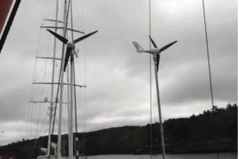 Cloud Chaser Yacht Photos Pics Sailboat with wind turbines, Hike Metal Products 67-foot ketch, cloudy sky, 1997 model.