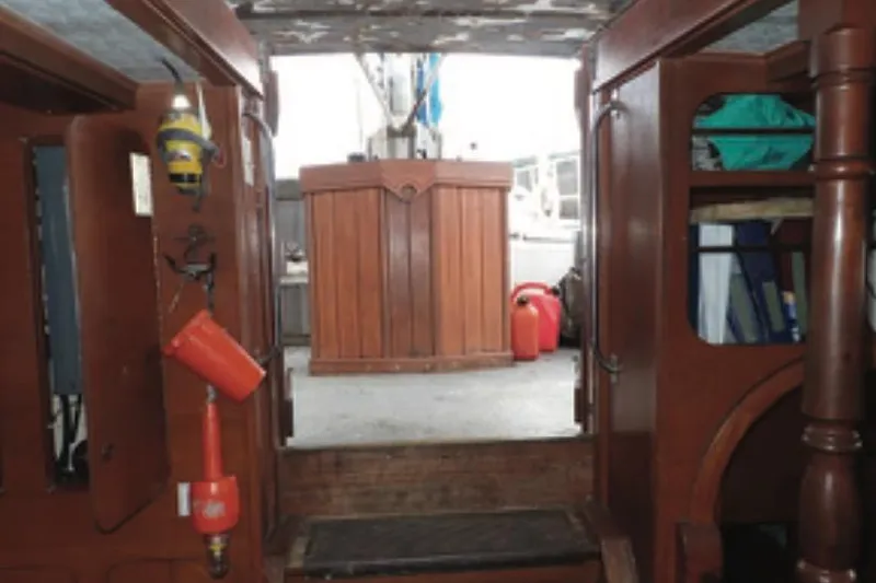 Cloud Chaser Yacht Photos Pics Interior view of a 1997 Hike Metal Products 67-foot steel ketch, featuring wooden cabinetry.