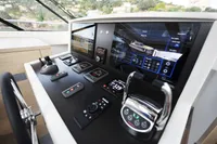 Control panel of a 2018 Steeler 52s yacht with advanced navigation displays.