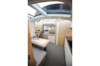 Luxurious interior of 2018 Steeler 52s yacht with modern design and skylight.
