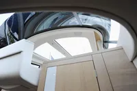 Interior view of 2018 Steeler 52s yacht, showcasing modern design and glass ceiling.