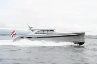 Steeler 52s 2018 yacht cruising on open water with a flag displayed.