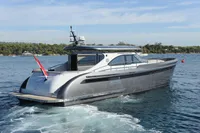 2018 Steeler 52s yacht cruising on a serene blue sea.