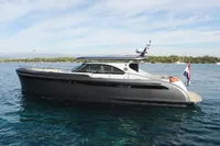 2018 Steeler 52s yacht on calm water, side view with clear sky.