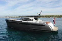 2018 Steeler 52s yacht on calm water, featuring sleek design and modern amenities.