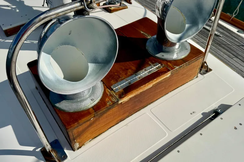Fandango Yacht Photos Pics Deck detail of 1982 Hinckley Bermuda 40 MK III sailboat with metal vents and wooden base.