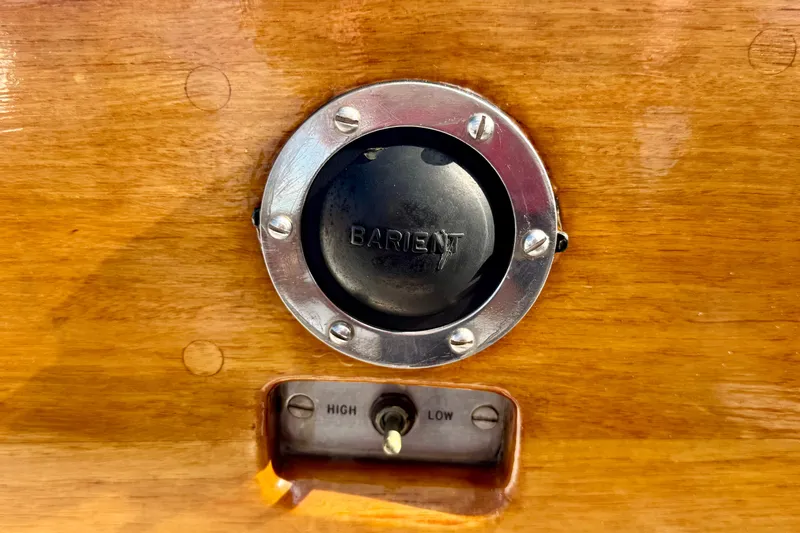 Fandango Yacht Photos Pics Barient winch control on 1982 Hinckley Bermuda 40 MK III sailboat, wooden panel background.