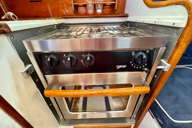 Fandango Yacht Photos Pics Stainless steel oven in 1982 Hinckley Bermuda 40 MK III yacht kitchen.