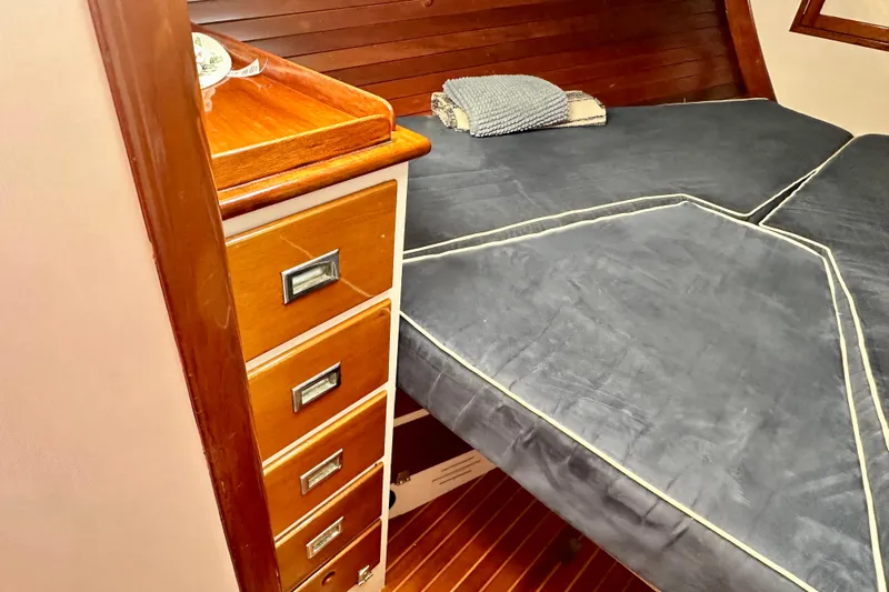 Fandango Yacht Photos Pics Interior cabin of 1982 Hinckley Bermuda 40 MK III with wooden drawers and bed.