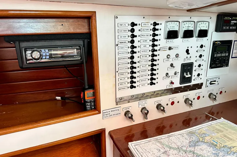 Fandango Yacht Photos Pics Control panel of 1982 Hinckley Bermuda 40 MK III sailboat with navigation equipment.