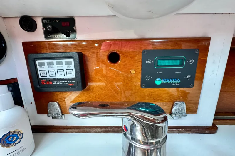 Fandango Yacht Photos Pics Control panel of 1982 Hinckley Bermuda 40 MK III with bilge pump and watermaker controls.