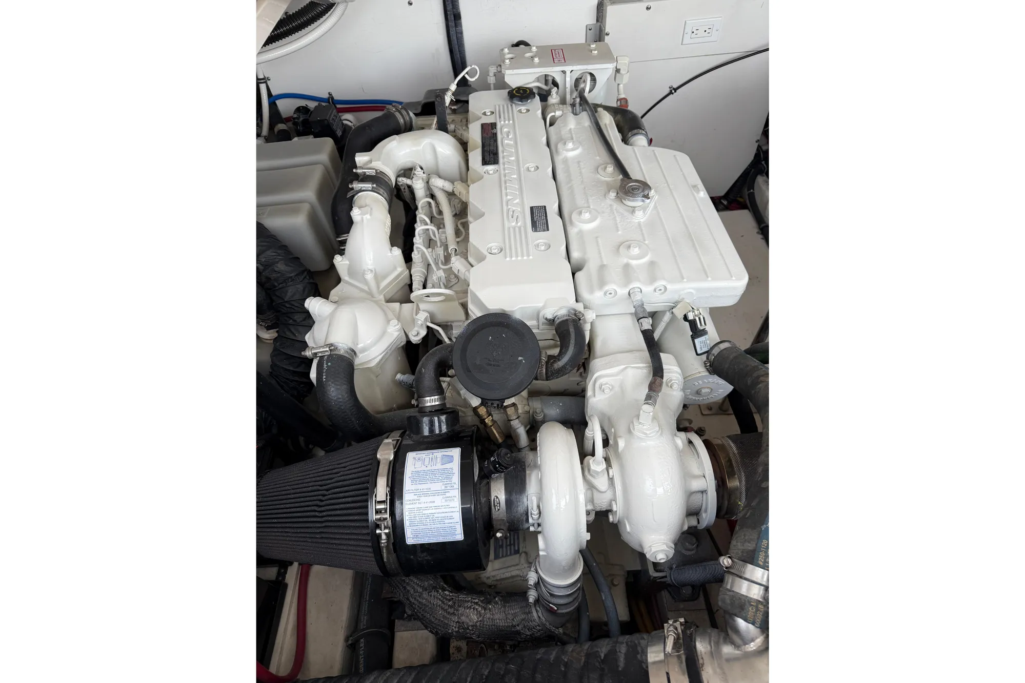 Engine of a 2005 Tiara 3600 Open boat, showcasing detailed components.