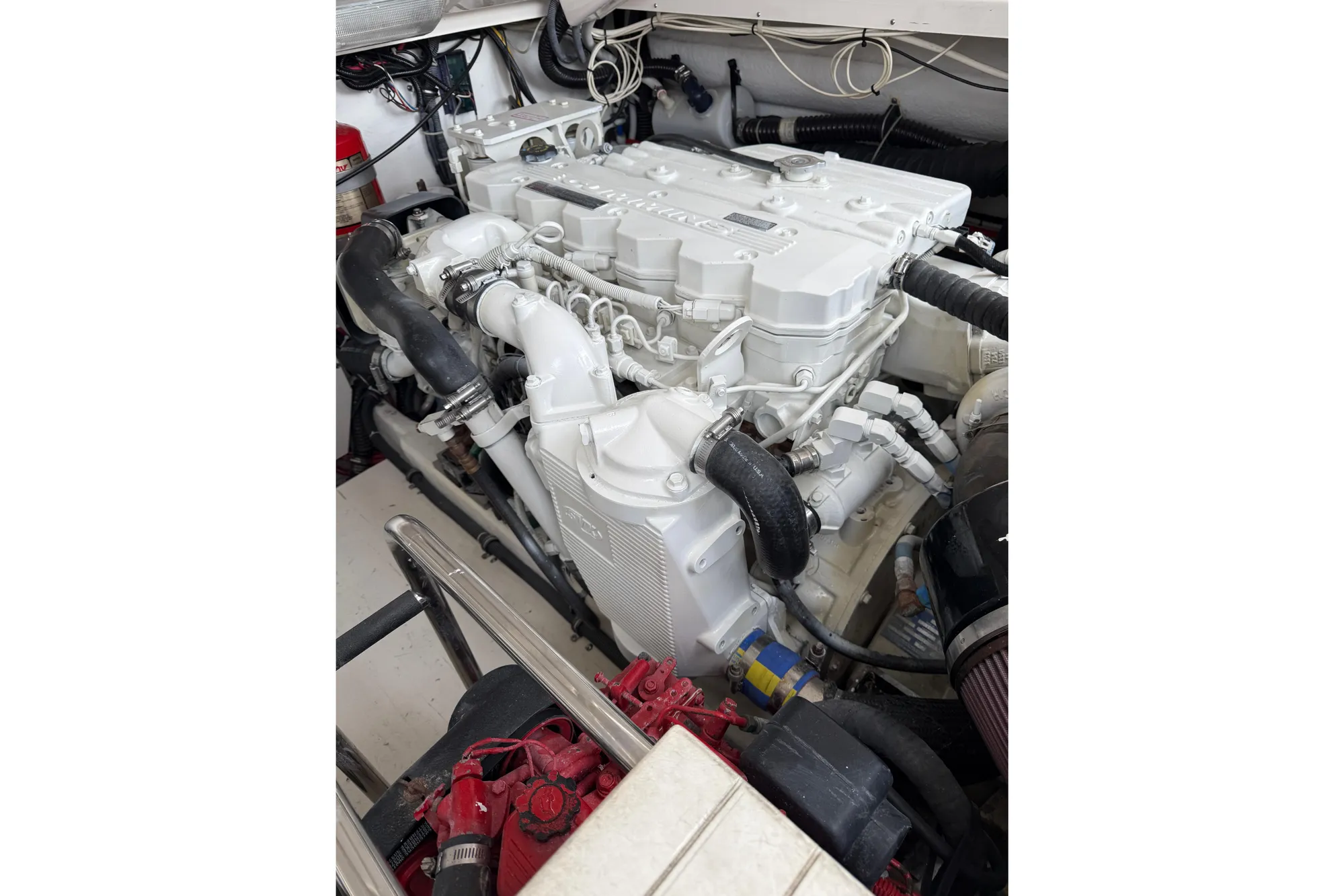 Engine compartment of a 2005 Tiara 3600 Open boat, showcasing detailed mechanical components.