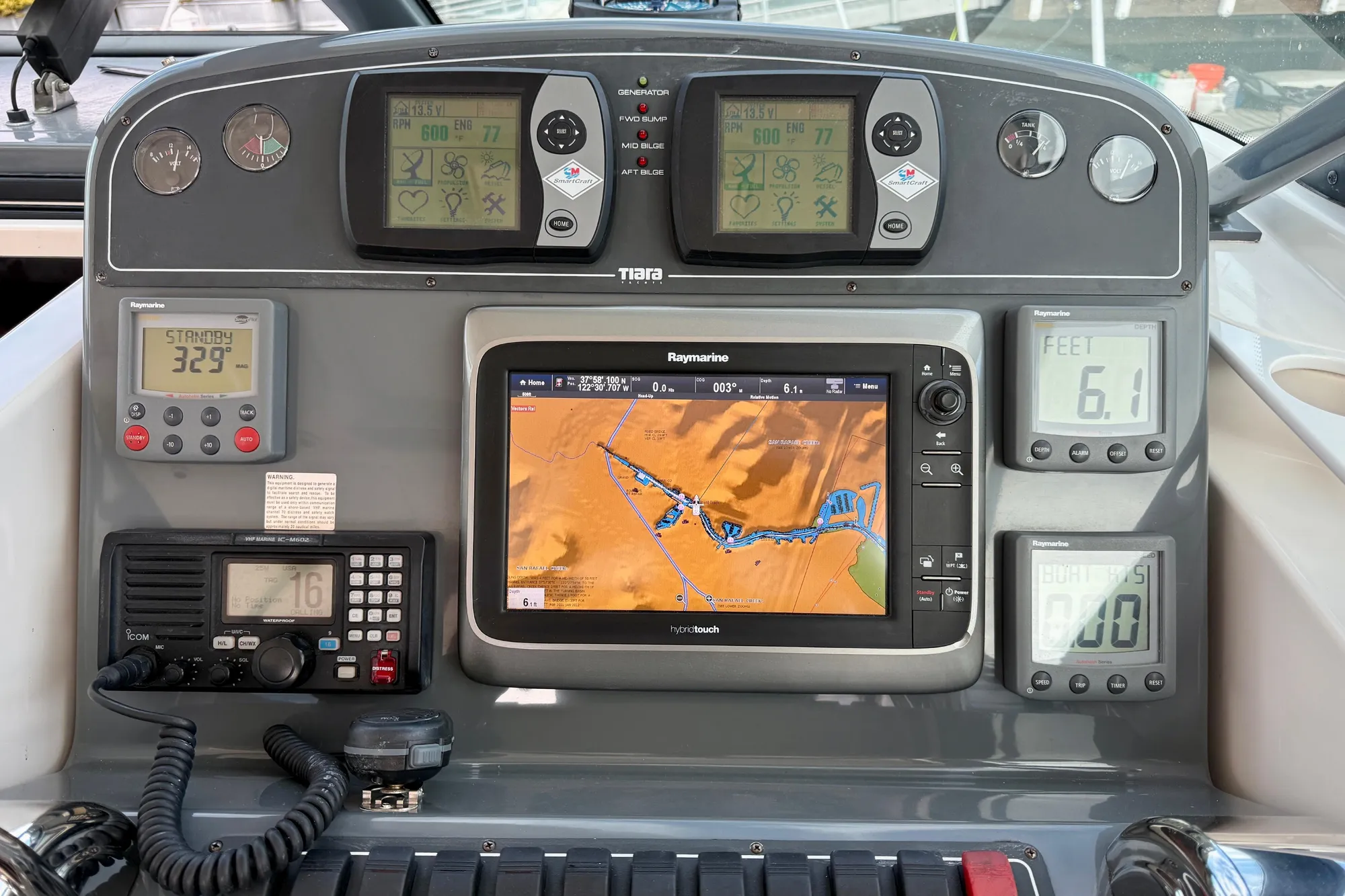 Tiara 3600 Open 2005 boat dashboard with navigation and control instruments.