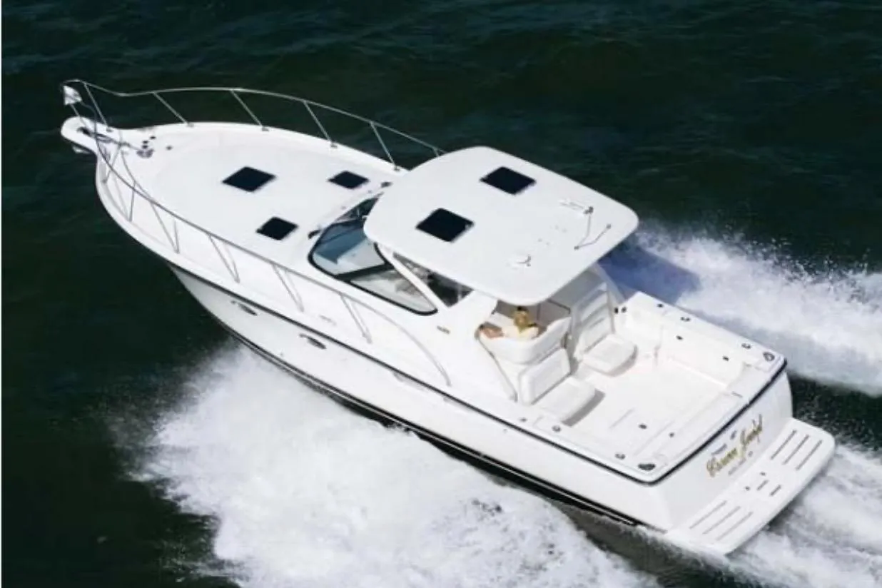 2005 Tiara Yachts 3600 Open cruising on water, showcasing sleek design and spacious deck.