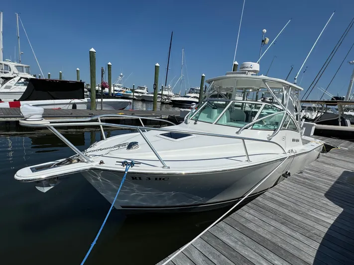 Destiny Yacht Photos Pics 2012 Albemarle 280 XF Express boat docked at marina under clear blue sky.